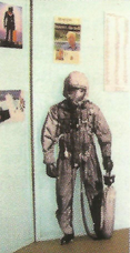 Coveralls over a an early model high altitude flight outfit